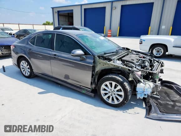 2019 Toyota Camry LE с VIN 4T1B11HK7KU815143, выставлен на аукционе Copart как лот 69475835 с пробегом 122 992 миль миль и Списание • Salvage title. История ставок и продаж доступна на DreamBid. Изображение 4.