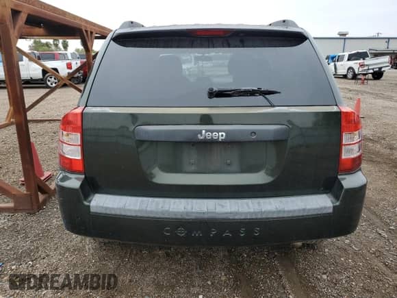 2010 Jeep Compass Sport z VIN 1J4NT1FB6AD626166, wystawiony jako Copart lot #88448045 z przebiegiem 181 098 mil mil oraz Szkoda całkowita • Salvage title. Historia ofert i sprzedaży dostępna na DreamBid. Obrazek 6.