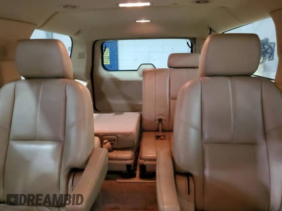 2011 Chevrolet Suburban LT with VIN 1GNSKJE38BR292711, listed as a Copart auction lot 82634175 with 213,707 mi miles and Salvage title. Bid and sale history available at DreamBid. Image 10.