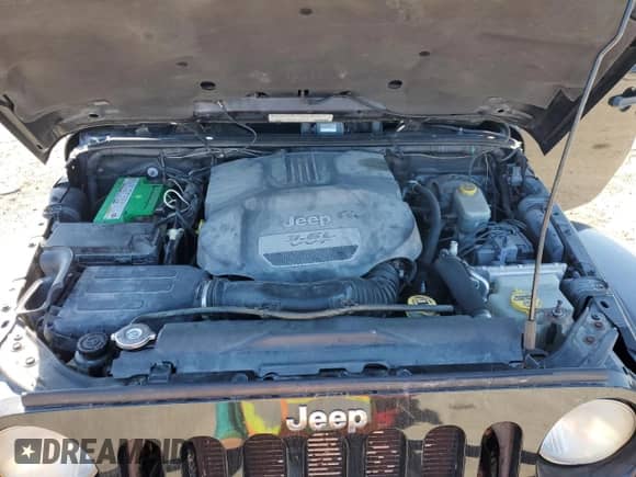 2012 Jeep Wrangler Sahara с VIN 1C4AJWBG1CL216425, выставлен на аукционе Copart как лот 48377825 с пробегом 99 649 миль миль и Списание • Salvage title. История ставок и продаж доступна на DreamBid. Изображение 11.