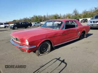 1966 Ford Mustang with VIN 6107T166712, listed as a Copart auction lot 63264085 with 2,893 mi miles and Salvage title. Bid and sale history available at DreamBid. Image 1.