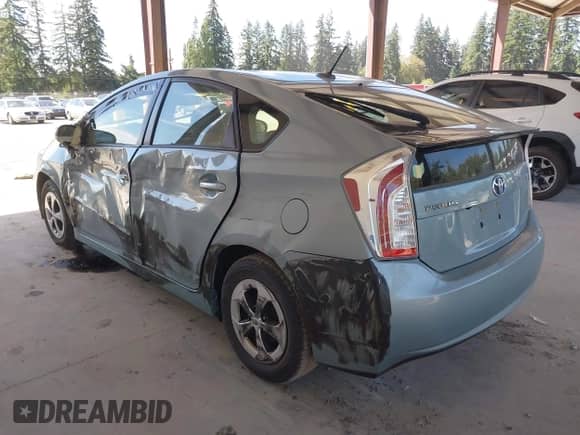 2013 Toyota Prius One with VIN JTDKN3DUXD1726781, listed as a IAAI auction lot 42991533 with 99,185 mi miles and . Bid and sale history available at DreamBid. Image 3.
