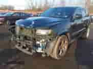 2015 Jeep Grand Cherokee SRT with VIN 1C4RJFDJ6FC744087, listed as a IAAI auction lot 41500653 with 130,530 mi miles and . Bid and sale history available at DreamBid. Image 21.