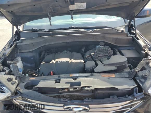 2015 Hyundai Santa Fe with VIN 5XYZUDLB0FG279064, listed as a Copart auction lot 63467345 with 69,935 mi miles and Salvage title. Bid and sale history available at DreamBid. Image 12.