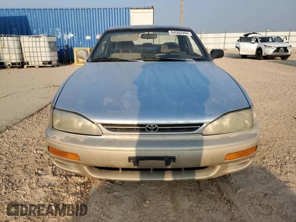 1995 Toyota Camry LE z VIN 4T1SK12C7SU548827, wystawiony jako Copart lot #64502944 z przebiegiem 215 266 mil mil oraz Szkoda całkowita • Salvage title. Historia ofert i sprzedaży dostępna na DreamBid. Obrazek 5.
