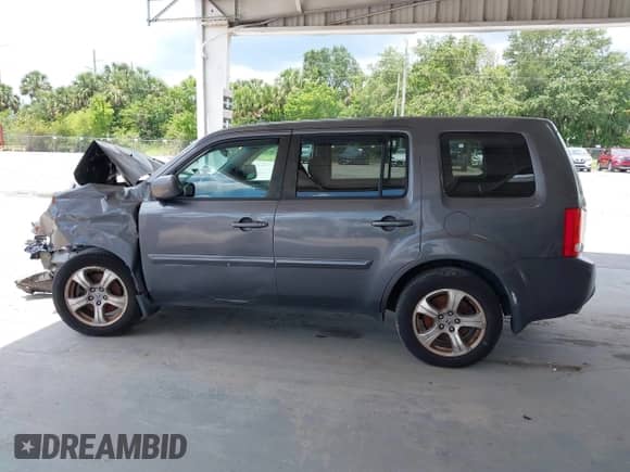 2014 Honda Pilot EX with VIN 5FNYF3H46EB024208, listed as a IAAI auction lot 42352992 with 228,058 mi miles and . Bid and sale history available at DreamBid. Image 13.