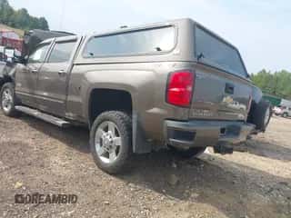2015 Chevrolet Silverado 2500HD High Country с VIN 1GC1KXE8XFF614341, выставлен на аукционе IAAI как лот 43154911 с пробегом Не указан миль и . История ставок и продаж доступна на DreamBid. Изображение 3.