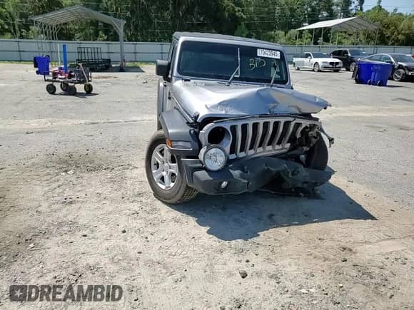 2020 Jeep Wrangler Sport S with VIN 1C4GJXAG8LW215563, listed as a Copart auction lot 70423945 with 69,559 mi miles and Salvage title. Bid and sale history available at DreamBid. Image 13.