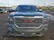 2017 GMC Sierra 1500 Denali with VIN 3GTP1PEJ8HG287682, listed as a Copart auction lot 84727334 with 143,711 mi miles and Salvage title. Bid and sale history available at DreamBid. Image 5.