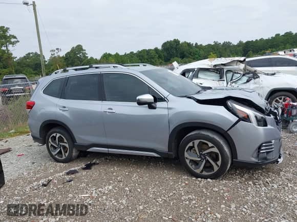 2023 Subaru Forester Touring z VIN JF2SKARC4PH471054, wystawiony jako IAAI lot #43156853 z przebiegiem 31 842 mil mil oraz . Historia ofert i sprzedaży dostępna na DreamBid. Obrazek 13.