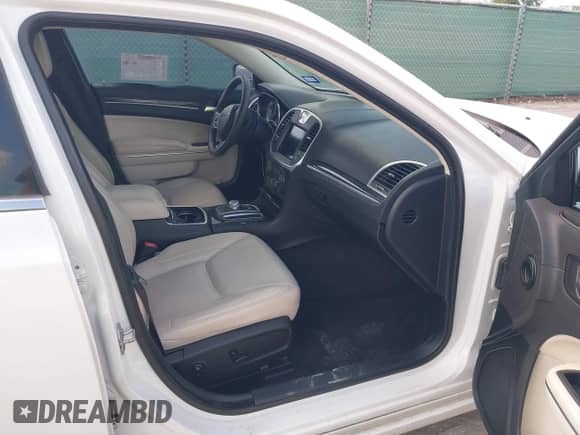 2017 Chrysler 300 Limited with VIN 2C3CCAAG2HH577680, listed as a IAAI auction lot 42927930 with 239,722 mi miles and . Bid and sale history available at DreamBid. Image 5.