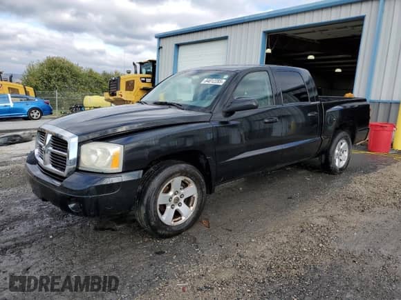 2007 Dodge Dakota SLT с VIN 1D7HW48PX7S199993, выставлен на аукционе Copart как лот 84012285 с пробегом 167 892 миль миль и Чистый • Clean title. История ставок и продаж доступна на DreamBid. Изображение 1.