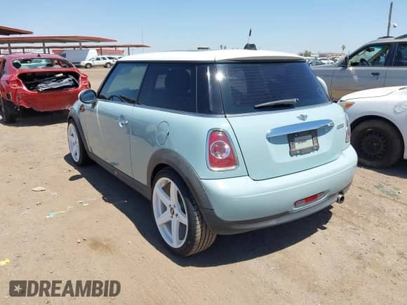 2012 MINI Hardtop with VIN WMWSU3C51CT261434, listed as a IAAI auction lot 42569468 with 100,930 mi miles and . Bid and sale history available at DreamBid. Image 3.
