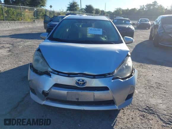 2012 Toyota Prius Four z VIN JTDKDTB33C1021669, wystawiony jako IAAI lot #43428200 z przebiegiem 164 072 mil mil oraz . Historia ofert i sprzedaży dostępna na DreamBid. Obrazek 6.