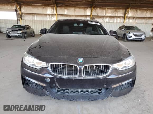 2015 BMW 4 Series 428i with VIN WBA4A9C54FGL86784, listed as a Copart auction lot 64073315 with 73,337 mi miles and Salvage title. Bid and sale history available at DreamBid. Image 5.