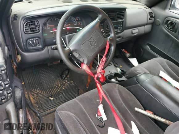 2000 Dodge Dakota Sport z VIN 1B7GG2AN0YS779786, wystawiony jako Copart lot #81118925 z przebiegiem 125 684 mil mil oraz Szkoda całkowita • Salvage title. Historia ofert i sprzedaży dostępna na DreamBid. Obrazek 8.