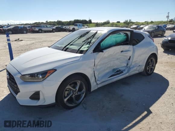 2020 Hyundai Veloster 2.0 z VIN KMHTG6AF3LU025773, wystawiony jako Copart lot #72772863 z przebiegiem 68 204 mil mil oraz . Historia ofert i sprzedaży dostępna na DreamBid. Obrazek 1.