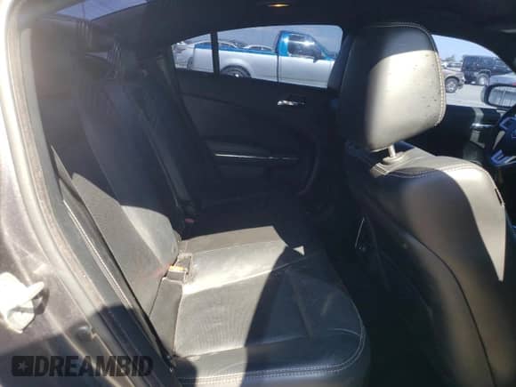 2013 Dodge Charger SXT Plus с VIN 2C3CDXHG5DH619209, выставлен на аукционе Copart как лот 66178325 с пробегом 104 464 миль миль и Списание • Salvage title. История ставок и продаж доступна на DreamBid. Изображение 10.