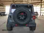 2022 Jeep Wrangler Unlimited High Tide z VIN 1C4HJXDG2NW221829, wystawiony jako Copart lot #64836074 z przebiegiem 3 394 mil mil oraz Szkoda całkowita • Salvage title. Historia ofert i sprzedaży dostępna na DreamBid. Obrazek 6.