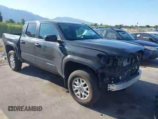 2024 Toyota Tacoma SR5 with VIN 3TMLB5JN2RM015950, listed as a IAAI auction lot 42598744 with 5,981 mi miles and . Bid and sale history available at DreamBid. Image 1.