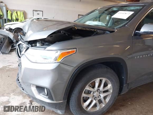 2018 Chevrolet Traverse LT Cloth z VIN 1GNEVGKW0JJ112303, wystawiony jako IAAI lot #43142872 z przebiegiem 37 974 mil mil oraz . Historia ofert i sprzedaży dostępna na DreamBid. Obrazek 6.