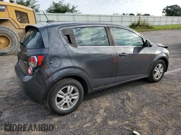 2016 Chevrolet Sonic LT с VIN 1G1JC6SBXG4121966, выставлен на аукционе Copart как лот 80300805 с пробегом 138 303 миль миль и На запчасти • Non repairable. История ставок и продаж доступна на DreamBid. Изображение 3.