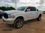 2015 Ram 1500 Laramie z VIN 1C6RR6NT3FS590976, wystawiony jako Copart lot #67740115 z przebiegiem 188 418 mil mil oraz Szkoda całkowita • Salvage title. Historia ofert i sprzedaży dostępna na DreamBid. Obrazek 1.