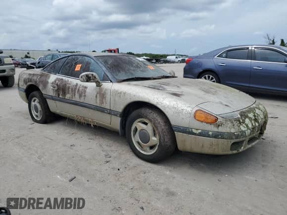 1992 Dodge Stealth with VIN JB3XD44S3NY039083, listed as a Copart auction lot 71502024 with 234,329 mi miles and Clean title. Bid and sale history available at DreamBid. Image 4.