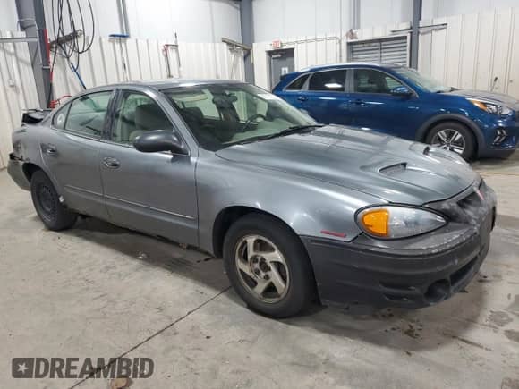 2005 Pontiac Grand Am SE z VIN 1G2NE52E25M211850, wystawiony jako Copart lot #59700235 z przebiegiem 273 286 mil mil oraz Szkoda całkowita • Salvage title. Historia ofert i sprzedaży dostępna na DreamBid. Obrazek 4.