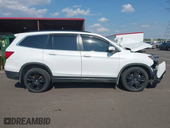 2022 Honda Pilot Special Edition z VIN 5FNYF6H26NB083789, wystawiony jako IAAI lot #43227852 z przebiegiem Nie podano mil oraz . Historia ofert i sprzedaży dostępna na DreamBid. Obrazek 12.