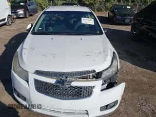 2013 Chevrolet Cruze LTZ z VIN 1G1PG5SB9D7101274, wystawiony jako IAAI lot #43313091 z przebiegiem Nie podano mil oraz . Historia ofert i sprzedaży dostępna na DreamBid. Obrazek 6.
