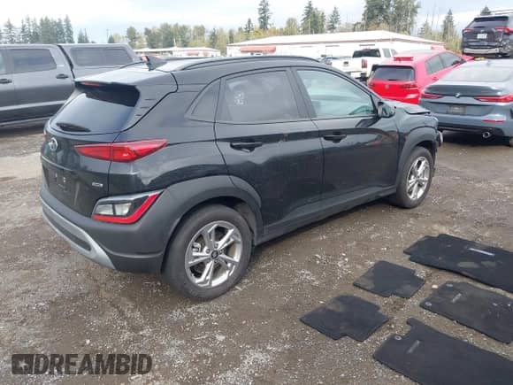 2023 Hyundai Kona SEL with VIN KM8K6CAB8PU958648, listed as a IAAI auction lot 43326670 with 30,396 mi miles and . Bid and sale history available at DreamBid. Image 4.