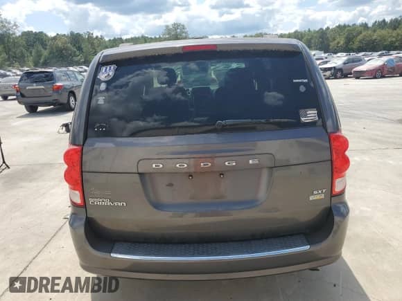 2016 Dodge Grand Caravan SXT with VIN 2C4RDGCG9GR376239, listed as a Copart auction lot 80192255 with 201,179 mi miles and Salvage title. Bid and sale history available at DreamBid. Image 6.