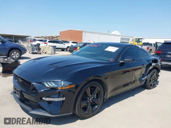 2022 Ford Mustang GT with VIN 1FA6P8CFXN5134440, listed as a IAAI auction lot 43142660 with 44,087 mi miles and . Bid and sale history available at DreamBid. Image 2.