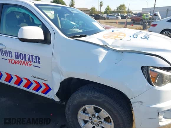 2020 Chevrolet Colorado 2WD Work Truck z VIN 1GCGSBEA9L1109870, wystawiony jako IAAI lot #43011811 z przebiegiem 133 845 mil mil oraz . Historia ofert i sprzedaży dostępna na DreamBid. Obrazek 19.
