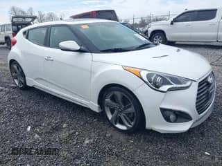 2013 Hyundai Veloster Turbo с VIN KMHTC6AE7DU117585, выставлен на аукционе IAAI как лот 42028116 с пробегом 102 382 миль миль и . История ставок и продаж доступна на DreamBid. Изображение 1.