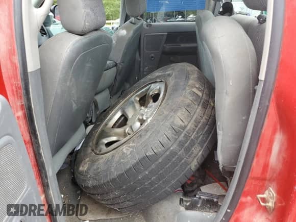 2006 Dodge 1500 SLT z VIN 1D7HA18NX6J111427, wystawiony jako Copart lot #70846545 z przebiegiem 151 569 mil mil oraz Szkoda całkowita • Salvage title. Historia ofert i sprzedaży dostępna na DreamBid. Obrazek 10.