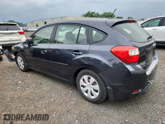 2014 Subaru Impreza 2.0i with VIN JF1GPAA69E8226071, listed as a Copart auction lot 67220805 with 140,689 mi miles and Salvage title. Bid and sale history available at DreamBid. Image 2.