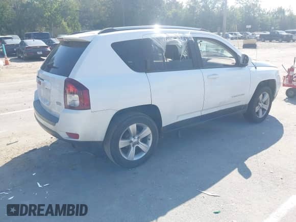 2014 Jeep Compass Latitude with VIN 1C4NJCEB3ED642937, listed as a IAAI auction lot 43228516 with Not provided miles and . Bid and sale history available at DreamBid. Image 4.