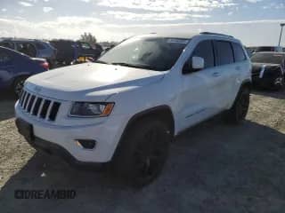 2016 Jeep Grand Cherokee Laredo with VIN 1C4RJEAG1GC340280, listed as a Copart auction lot 86182385 with 156,991 mi miles and Clean title. Bid and sale history available at DreamBid. Image 1.
