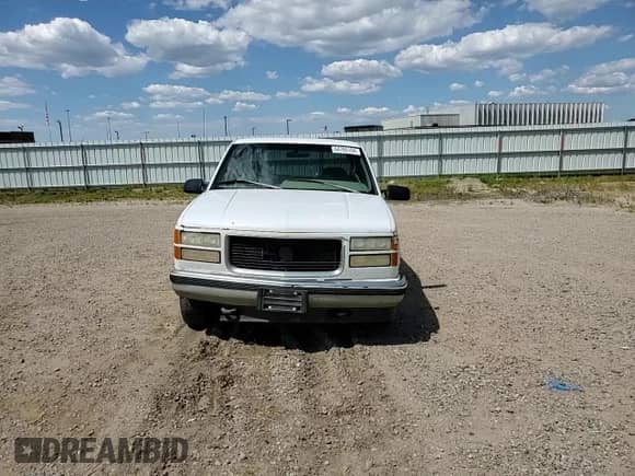 1995 GMC Sierra 1500 z VIN 2GTEC19K8S1573758, wystawiony jako Copart lot #64785104 z przebiegiem 191 121 mil mil oraz Szkoda całkowita • Salvage title. Historia ofert i sprzedaży dostępna na DreamBid. Obrazek 11.