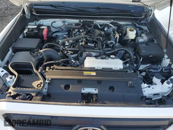 2024 Toyota Tacoma SR5 z VIN 3TYLB5JN6RT040080, wystawiony jako Copart lot #86147085 z przebiegiem 7 596 mil mil oraz Szkoda całkowita • Salvage title. Historia ofert i sprzedaży dostępna na DreamBid. Obrazek 11.
