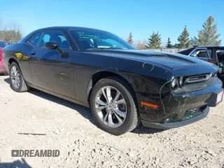 2021 Dodge Challenger SXT z VIN 2C3CDZGG0MH560955, wystawiony jako IAAI lot #42030769 z przebiegiem 78 790 mil mil oraz . Historia ofert i sprzedaży dostępna na DreamBid. Obrazek 1.