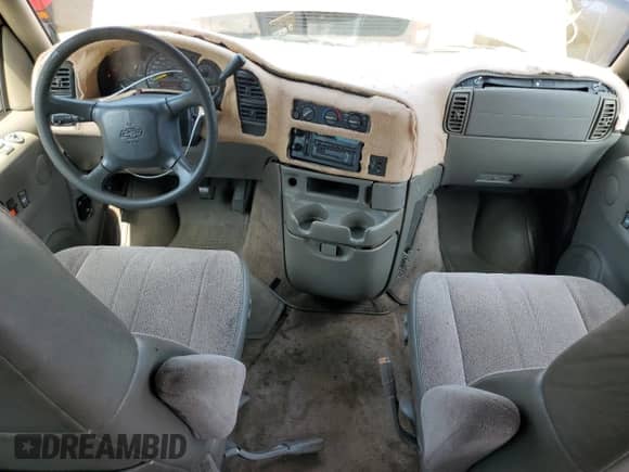 1999 Chevrolet Astro с VIN 1GNDM19W3XB162150, выставлен на аукционе Copart как лот 63467165 с пробегом 202 519 миль миль и Списание • Salvage title. История ставок и продаж доступна на DreamBid. Изображение 10.