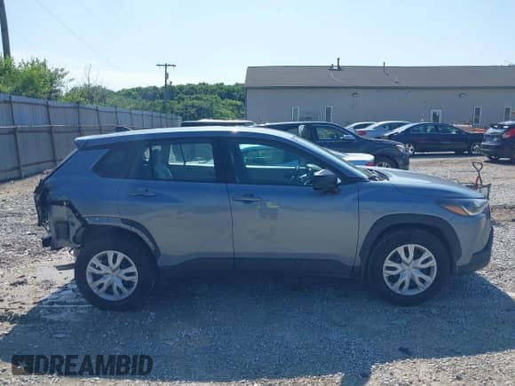 2022 Toyota Corolla Cross L with VIN 7MUAAABGXNV035110, listed as a IAAI auction lot 42562359 with 17,106 mi miles and . Bid and sale history available at DreamBid. Image 14.