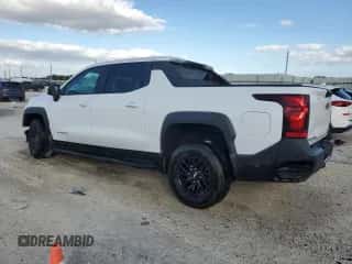 2024 Chevrolet Silverado EV Work Truck z VIN 1GC10VEL1RU200511, wystawiony jako Copart lot #85029964 z przebiegiem Nie podano mil oraz Czysty tytuł • Clean title. Historia ofert i sprzedaży dostępna na DreamBid. Obrazek 2.