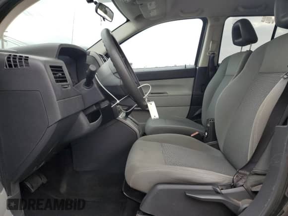 2007 Jeep Compass Sport with VIN 1J8FT47W47D180968, listed as a Copart auction lot 84296085 with 96,757 mi miles and Salvage title. Bid and sale history available at DreamBid. Image 7.