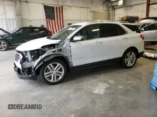 2020 Chevrolet Equinox Premier с VIN 2GNAXYEX5L6155070, выставлен на аукционе Copart как лот 82531575 с пробегом 12 750 миль миль и Списание • Salvage title. История ставок и продаж доступна на DreamBid. Изображение 1.