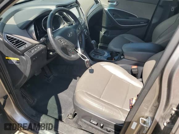 2016 Hyundai Santa Fe с VIN 5XYZW4LA2GG306509, выставлен на аукционе Copart как лот 70261325 с пробегом 131 880 миль миль и Списание • Salvage title. История ставок и продаж доступна на DreamBid. Изображение 7.