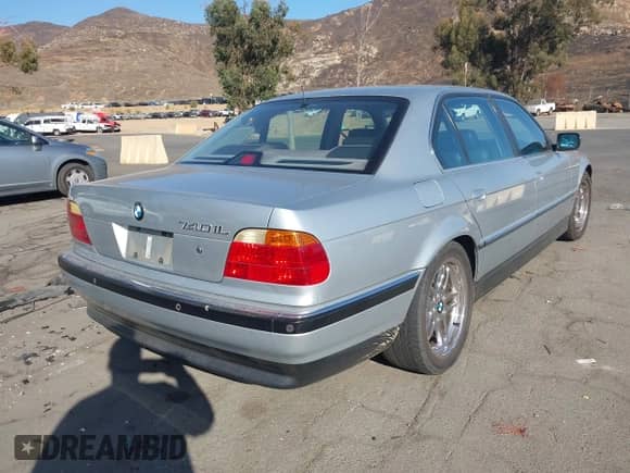1997 BMW 7 Series 740iL with VIN WBAGJ8329VDL44964, listed as a IAAI auction lot 43379296 with 198,882 mi miles and . Bid and sale history available at DreamBid. Image 4.